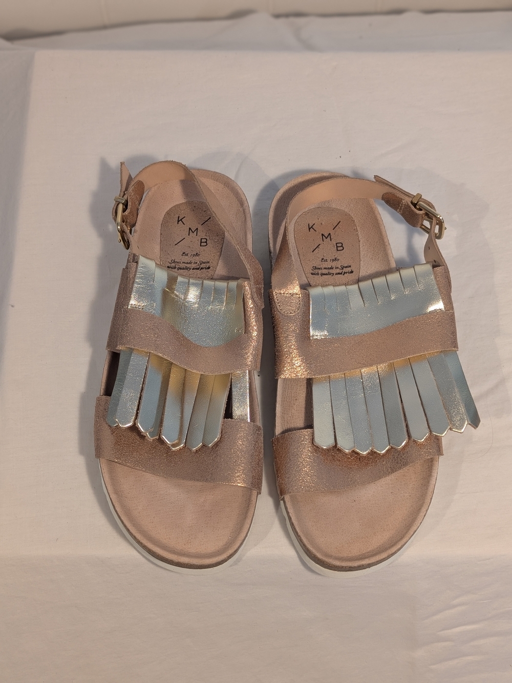 Women's Metallic Fringe Sandals in Rose Gold